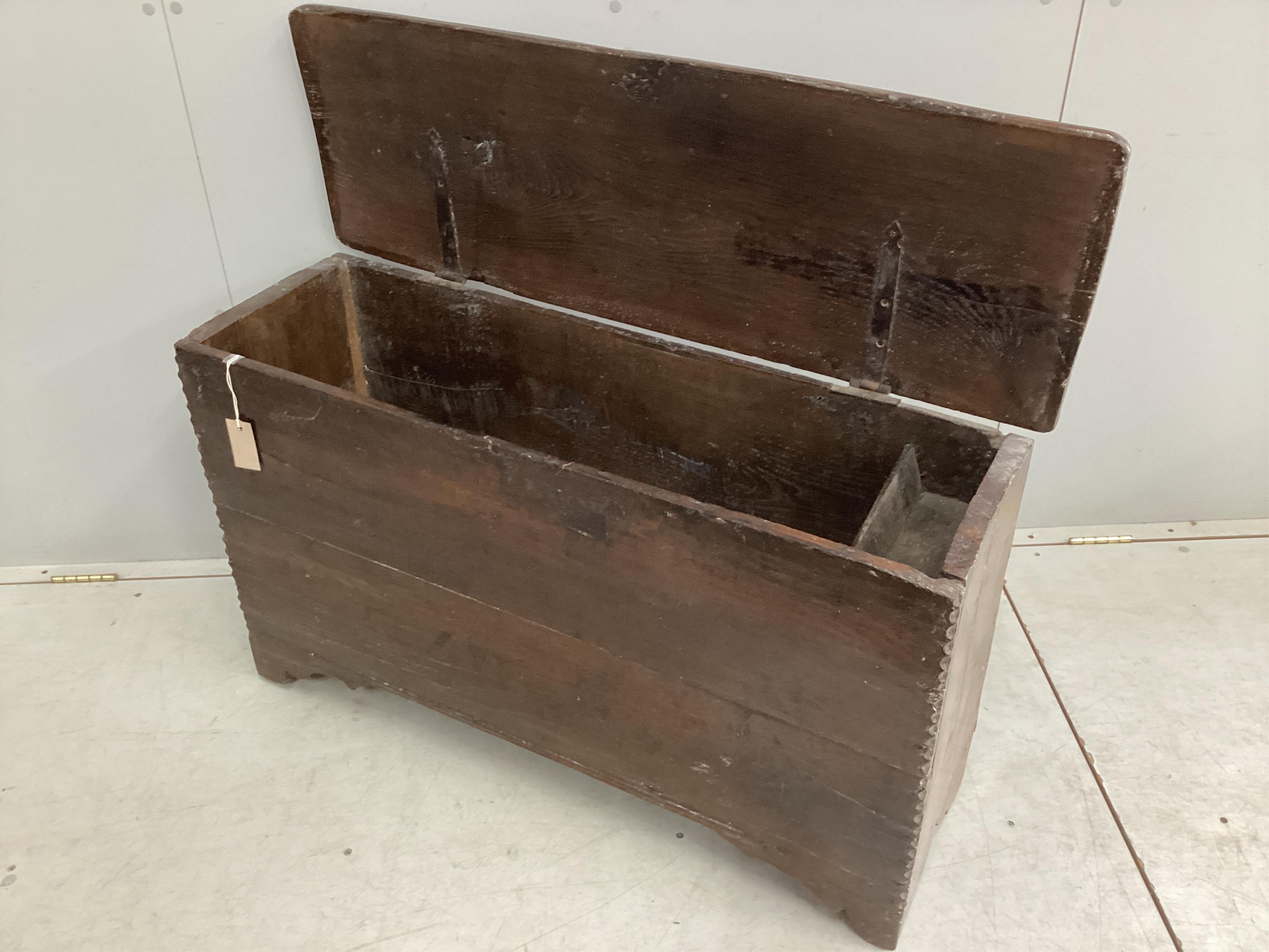 A 17th century oak six plank coffer, width 104cm, depth 34cm, height 60cm. Condition - fair